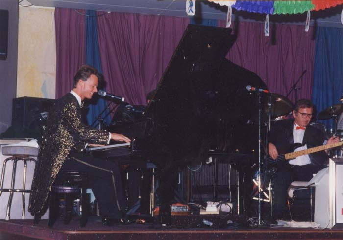 Jon England at grand piano